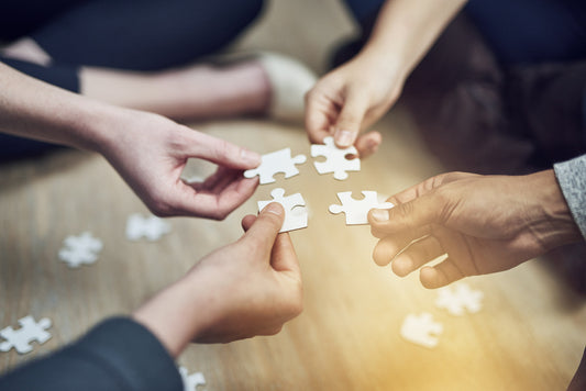 Benefits of Doing Puzzles at Corporate Team-Building Events